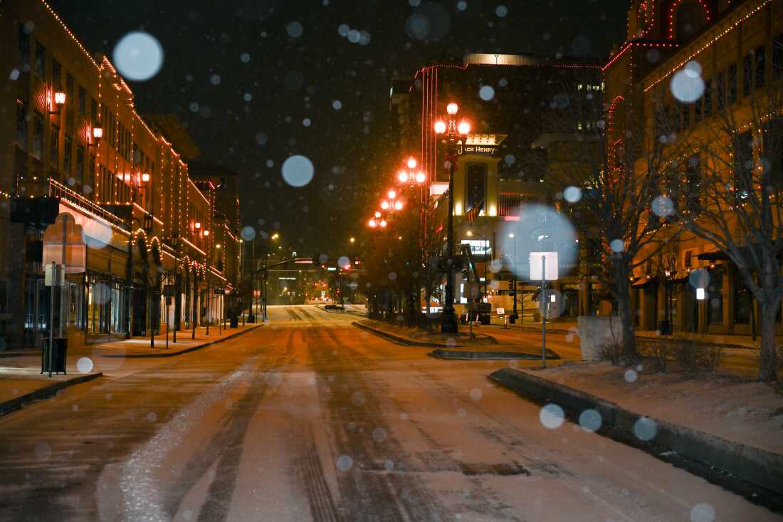 Snow falls during a winter storm in Kansas City, Missouri.