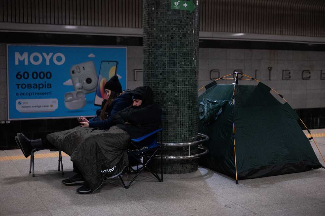 People take shelter in a subway station during Russia's night missile and drone attack in Kyiv, Ukraine, on Saturday, Jan. 24, 2026.