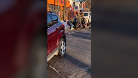 Footage appears to show moment Alex Pretti is shot dead by federal agents in Minneapolis – video