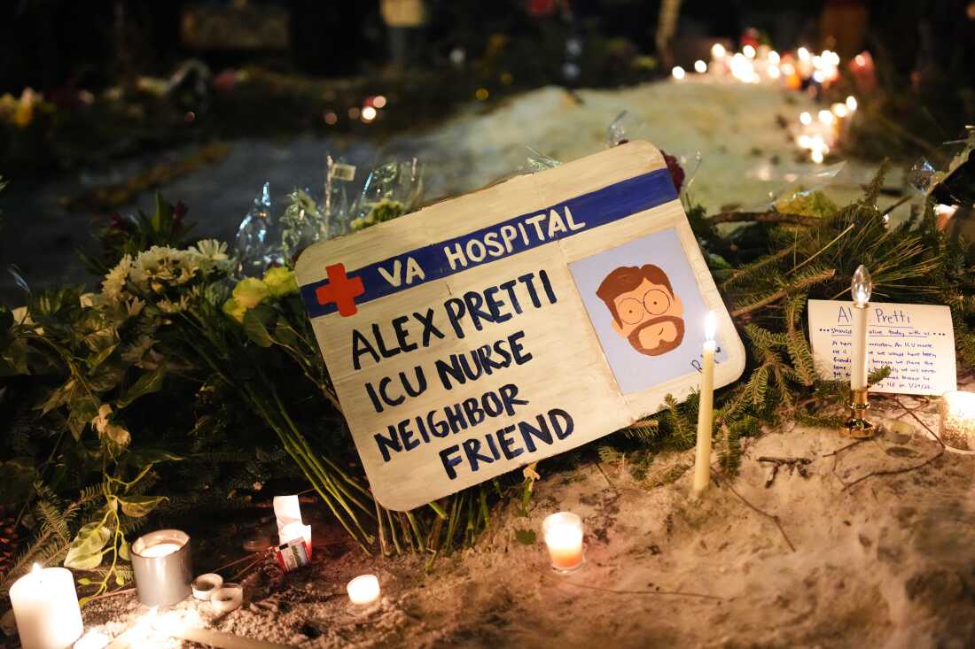 A sign for 37-year-old Alex Pretti, who was fatally shot by a U.S. Border Patrol officer earlier in the day, is displayed during a vigil Saturday, Jan. 24, 2026, in Minneapolis.