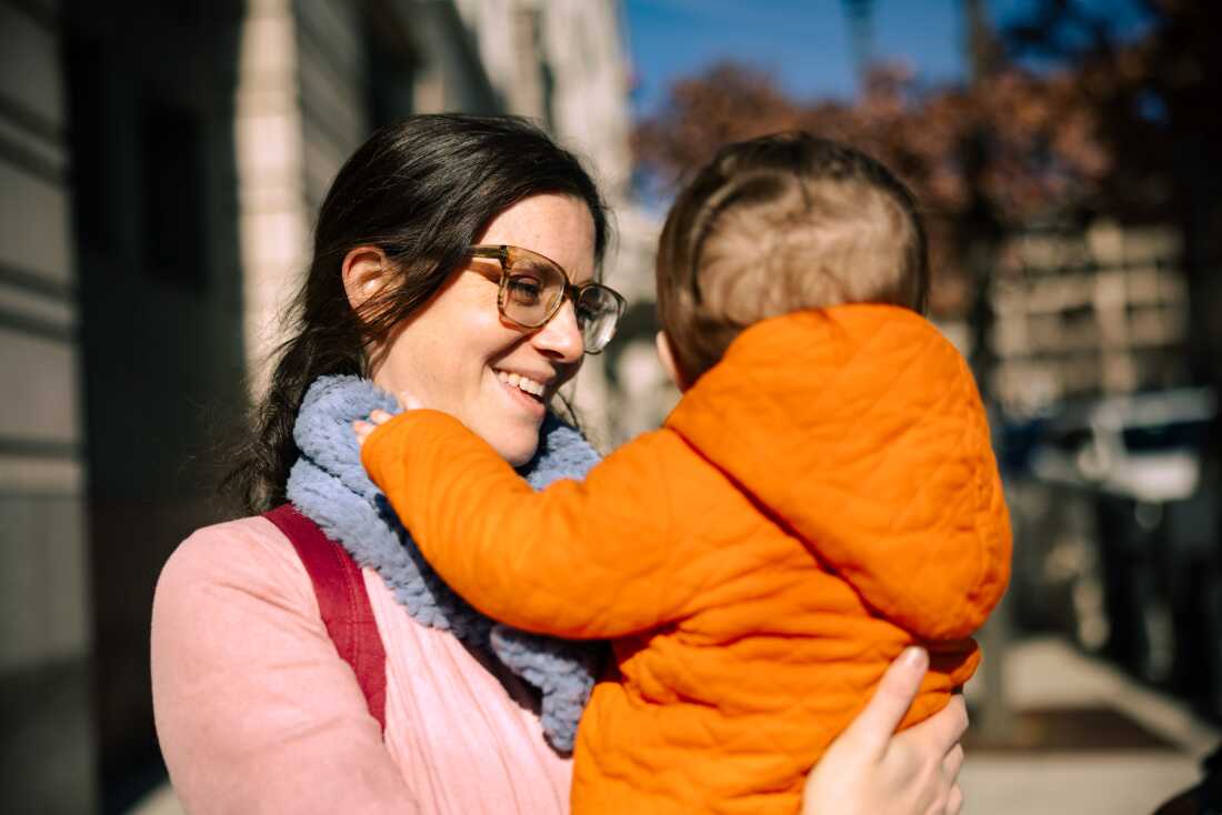 Florencia Paz holds her toddler son after her naturalization ceremony at the E. Barrett Prettyman United States Court House in Washington, D.C. in the morning on Jan. 13.