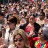 Participants recite the Oath of Allegiance during a naturalization ceremony for new U.S. citizens in Seattle on July 4, 2025. Under the Trump administration, new applicants for naturalization will to take a more difficult civics test that the government says is intended to ensure that only immigrants who are "fully assimilated" will become new citizens. (Photo by David Ryder/Getty Images)