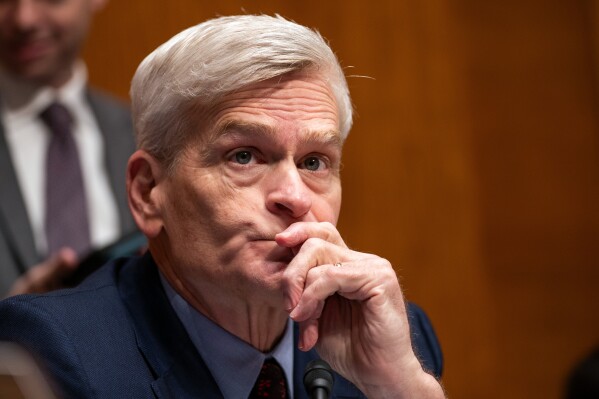FILE - Senate Health, Education, Labor, and Pensions Committee Chairman Bill Cassidy, R-La., listens at a hearing on the effects of artificial intelligence on American families and the workforce on Capitol Hill in Washington, Oct. 9, 2025. (AP Photo/Allison Robbert)
