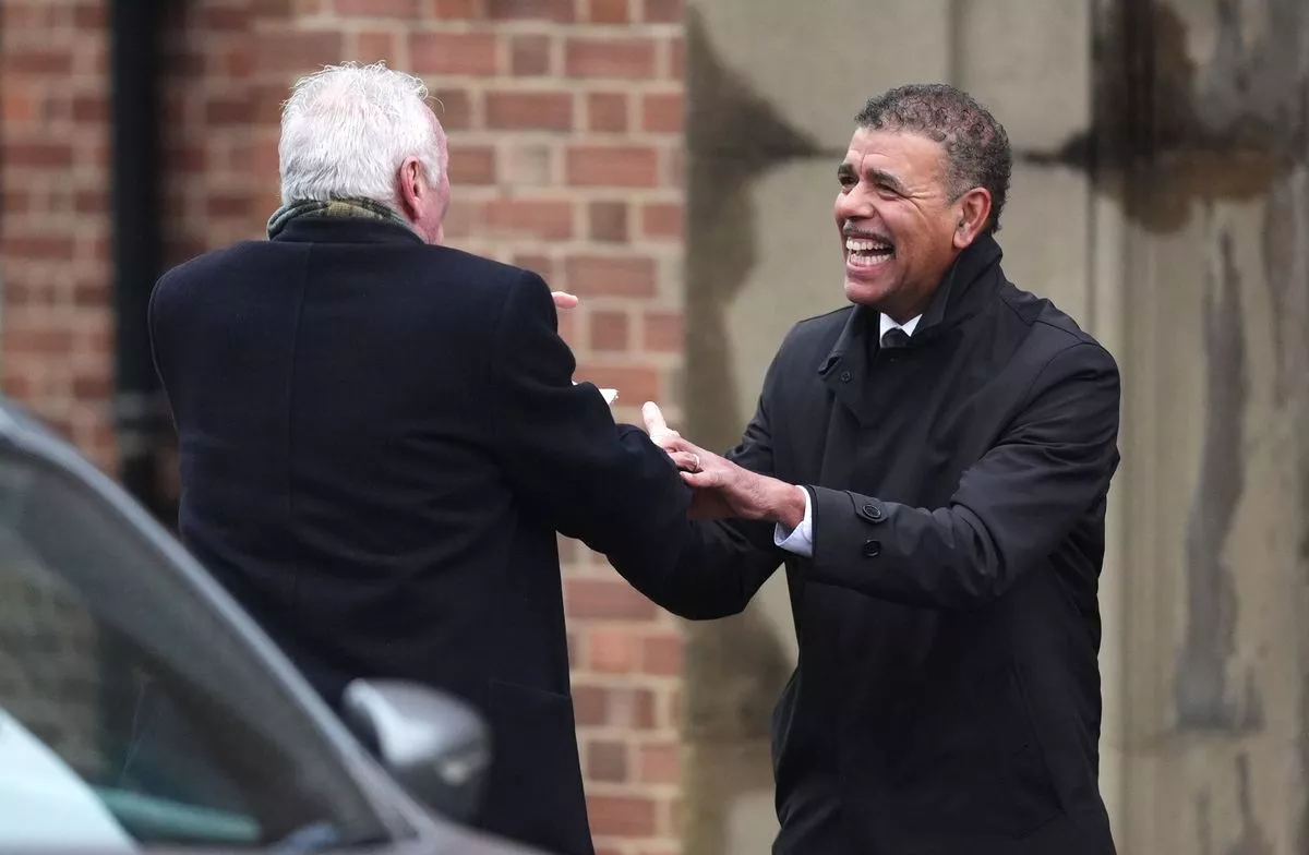 Chris Kamara (right) and Eddie Gray following the funeral service for Terry Yorath 