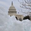 The dome of the U.S. Capitol is framed by snow on Jan 26. A fight in the Senate over DHS funding following the death of Alex Pretti in Minneapolis has the government on track for a partial shutdown at the end of this week.