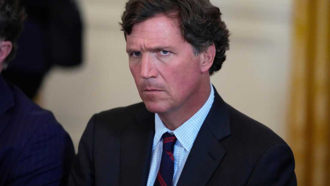 Tucker Carlson attends a meeting with President Donald Trump and oil executives in the East Room of the White House on Jan. 9, 2026.