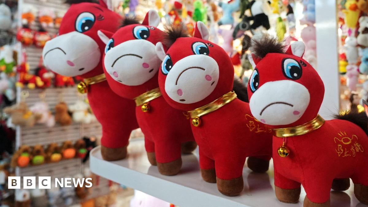 Crying horse plush toys sit on display ahead of the Chinese Lunar New Year, which will welcome the Year of the Horse, at Yiwu International Trade City in Yiwu, Zhejiang province, China.