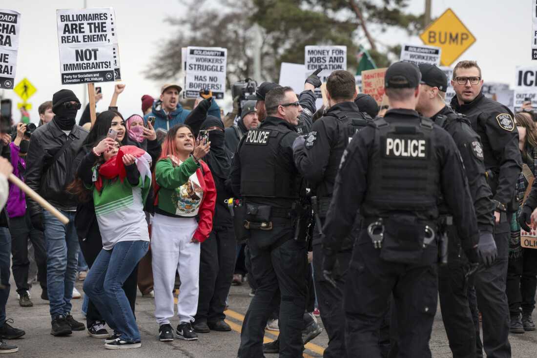Demonstrators record Seattle police officers during a march against Immigration and Customs Enforcement (ICE) in Seattle on Feb. 8, 2025. Bystander videos have become central to public understanding of many news events.