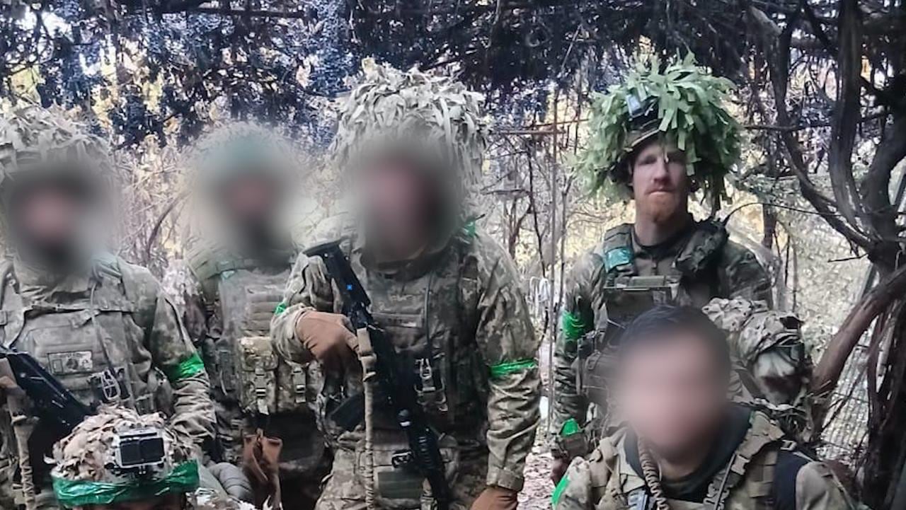 In this photo taken near Sloviansk Ukraine on Nov. 8 2025, Rauser along with the rest of his team get set to head out on a mission. He was shot two days later. 