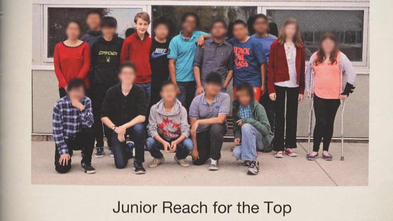 Students pose for the Junior Reach for the Top team photo. 