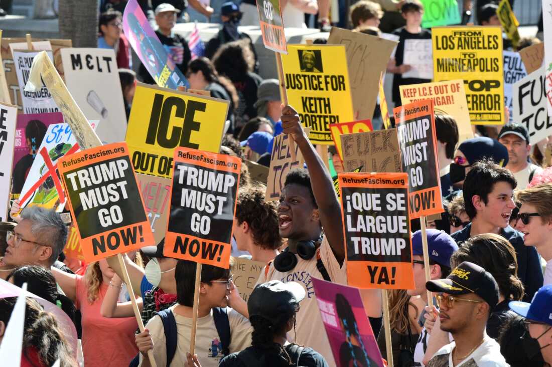 People partake in a "National Shutdown" protest against US Immigration and Customs Enforcement (ICE) in Los Angeles on January 30, 2026. Donald Trump's border chief said January 29, 2026 that some federal agents could be withdrawn from Minneapolis, the northern US city that has become the flashpoint for the president's immigration crackdown. The Trump administration, facing a public backlash over the shooting deaths of two Americans by federal agents in Minneapolis, also eased immigration operations in the northeastern state of Maine. (Photo by  / AFP via Getty Images)