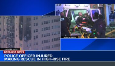 Police officer injured while making rescue during residential high-rise building fire in Atlantic City, New Jersey