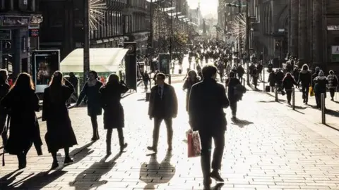 Getty Images A sunlit view of Buchanan Street in Glasgow.