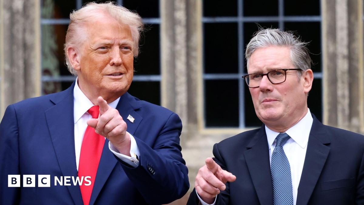 US President Donald Trump and Prime Minister Sir Keir Starmer point at cameras at Chequers during the president's state visit to the UK in September.
