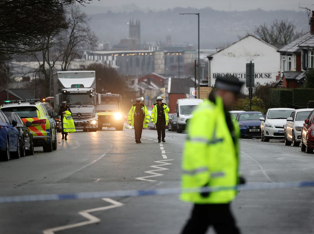 The police scene on Wigan Road in Bolton
