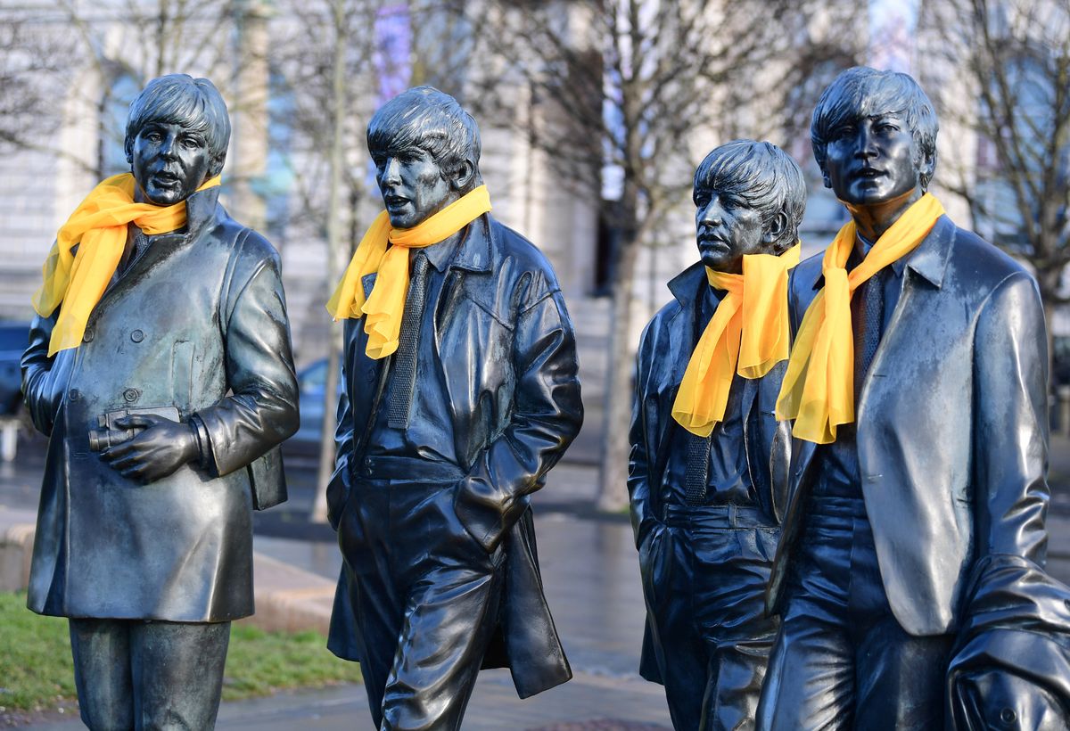 The Beatles statues wore yellow scarves to celebrate the Tour de France announcement this week