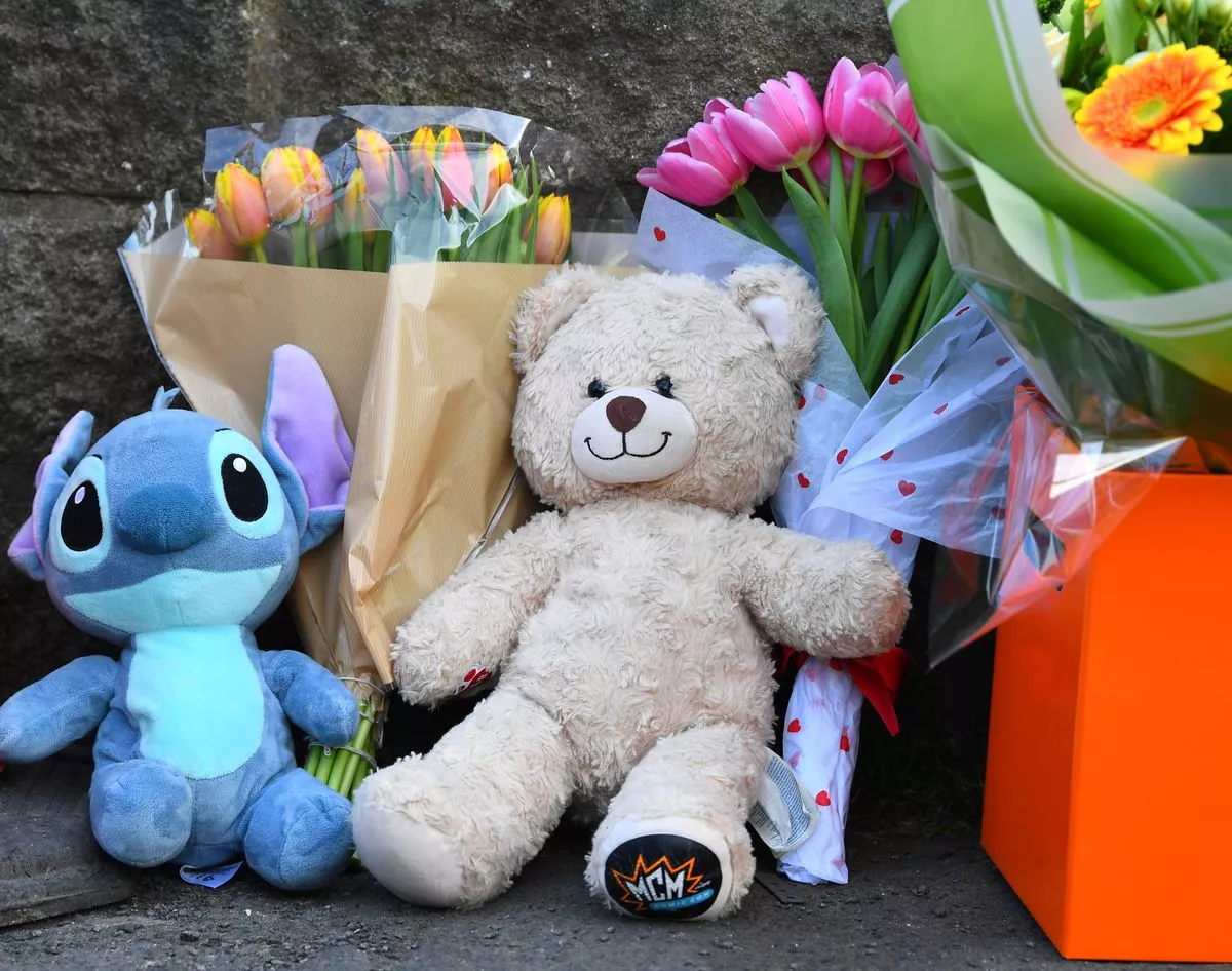 Disney characters and teddy bears were among tributes left in memory of the 13-year-old