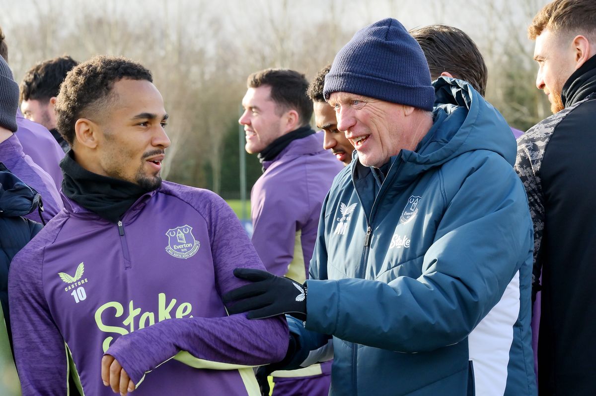 Everton manager David Moyes greets Iliman Ndiaye as he returns to training at Finch Farm after winning AFCON with Senegal