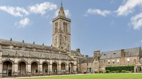 Getty Images St Andrews University courtyard with a clock tower above university buildings