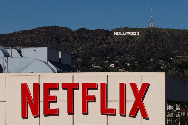 Netflix slightly beats revenue estimates, shares slide amid bidding war for Warner Bros
