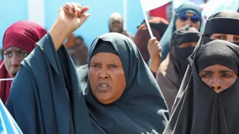 Reuters Dressed in traditional Islamic attire, Somali women protest in Hodan district in Mogadishu on 7 January during a demonstration against what they describe as Israel’s interference in Somalia’s sovereignty and its recognition of the self‑declared Republic of Somaliland as an independent  state.
