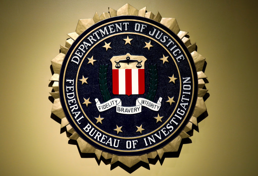 The Federal Bureau of Investigation seal is seen at FBI headquarters before a news conference by the FBI Director the insp...