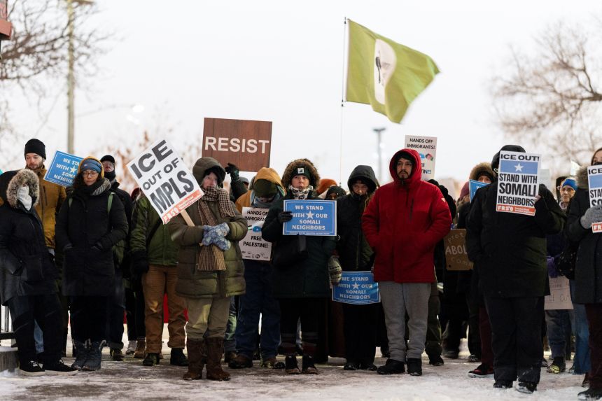 Demonstrators rally in protest against Immigration and Customs Enforcement amid a reported federal immigration operation targeting the Somali community in Minneapolis, Minnesota, on December 8, 2025.