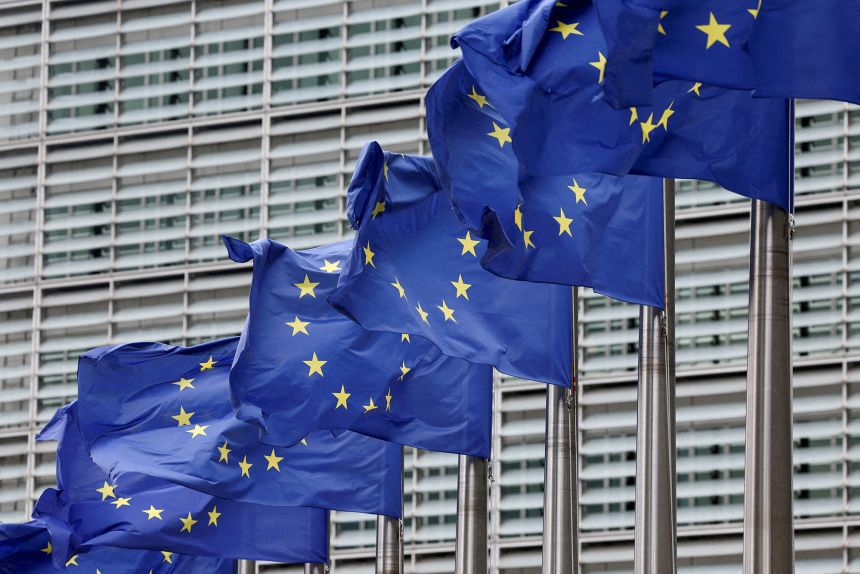 European Union flags flutter outside the EU Commission headquarters in Brussels, Belgium July 16, 2025.