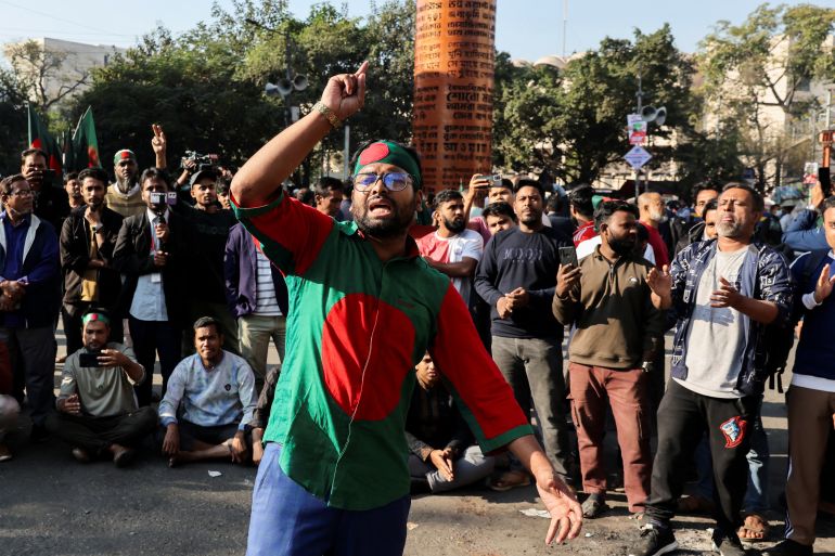 Supporters chant slogans as they block Shahbagh Square demanding justice, following the death of Sharif Osman Hadi, a student leader, who was undergoing treatment in Singapore after being shot in the head, in Dhaka, Bangladesh, December 19, 2025 [Mohammad Ponir Hossain/Reuters]