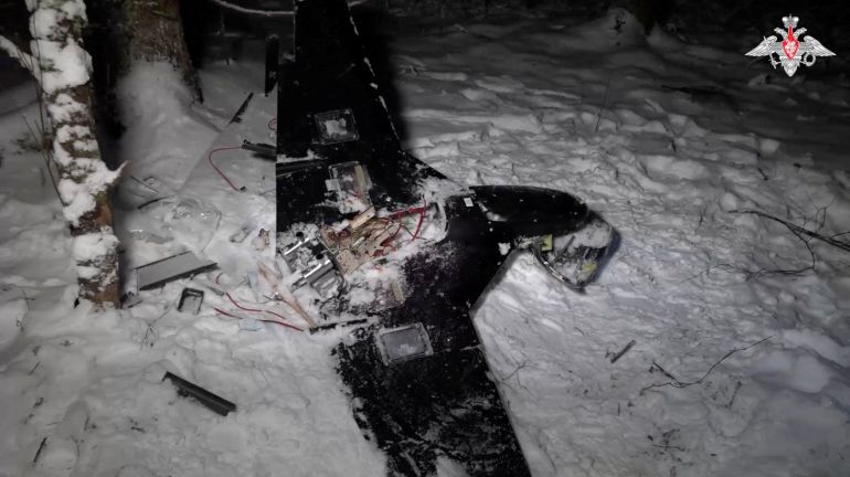 FILE PHOTO: The remains of a drone, which, according to the Russian Defence Ministry, was downed during the repelling of an alleged Ukrainian attack on the Russian presidential residence in the Novgorod Region, in an unknown location in Russia, in this still image from a video released December 31, 2025. Russian Defence Ministry/Handout via REUTERS ATTENTION EDITORS - THIS IMAGE WAS PROVIDED BY A THIRD PARTY. AS IS. NO RESALES. NO ARCHIVES. MANDATORY CREDIT. WATERMARK FROM SOURCE./File Photo