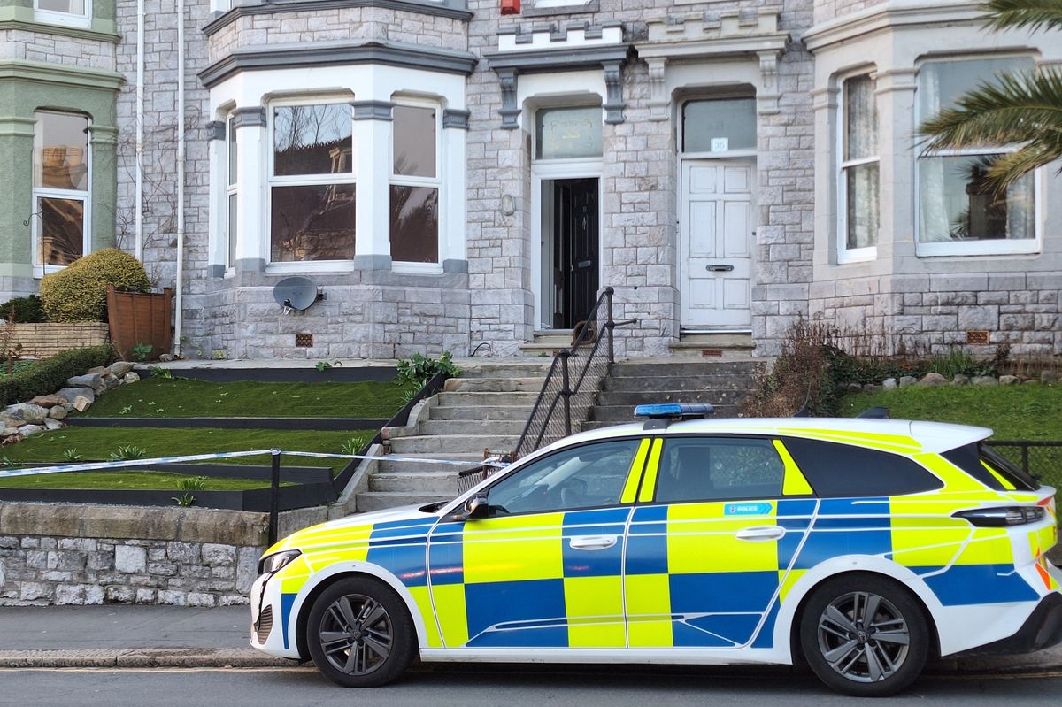 Police on scene guard following acid attack incident in Lipson Road, Plymouth