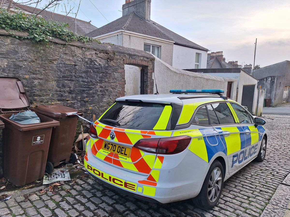 Police on scene guard following acid attack incident in Lipson Road, Plymouth