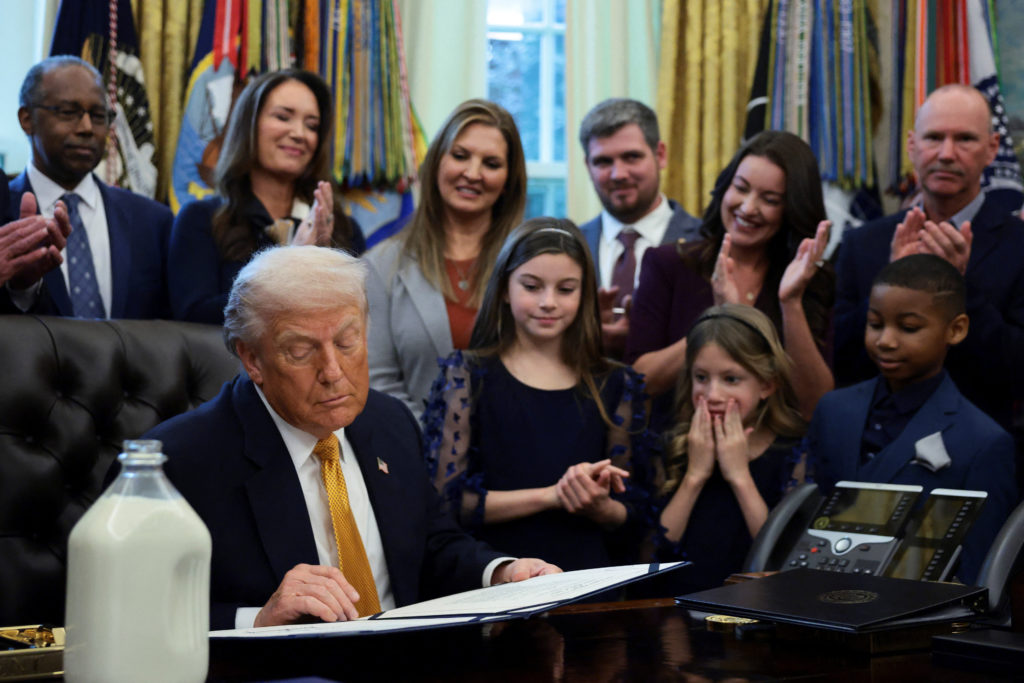 WATCH: Trump signs a law returning whole milk to school lunches