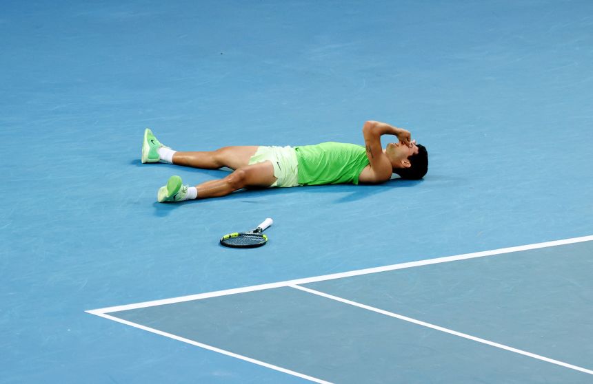 Alcaraz fell to the floor after winning his semifinal match against Zverev.