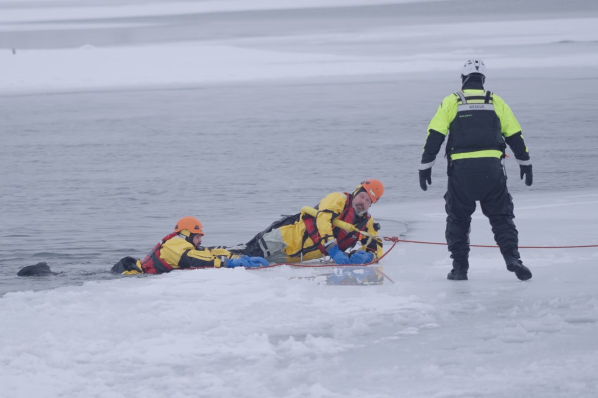 'Be prepared': Volunteers dive into ice rescue training at Bellevue Marina