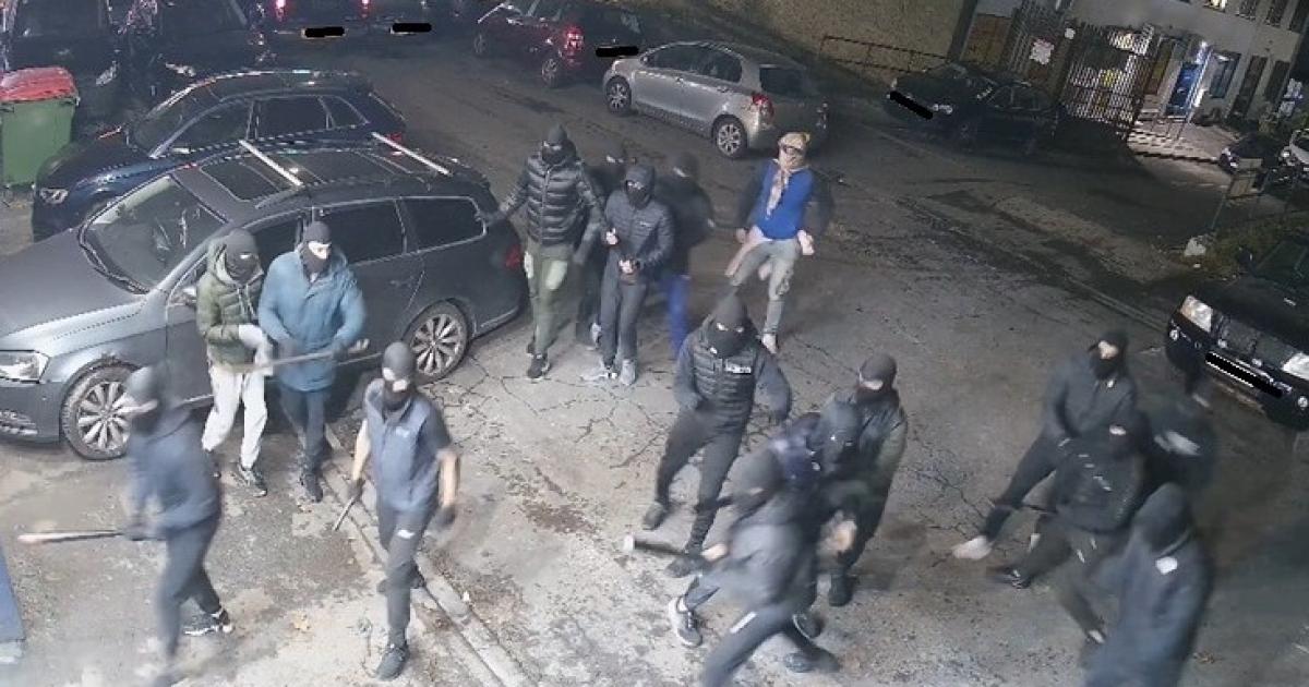 Shocking CCTV shows masked mob at garage in Leeds Road