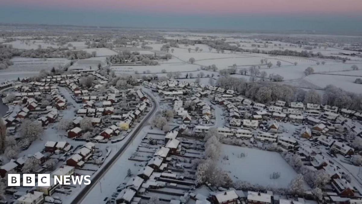 An aerial view of snow-covered homes in North Staffordshire