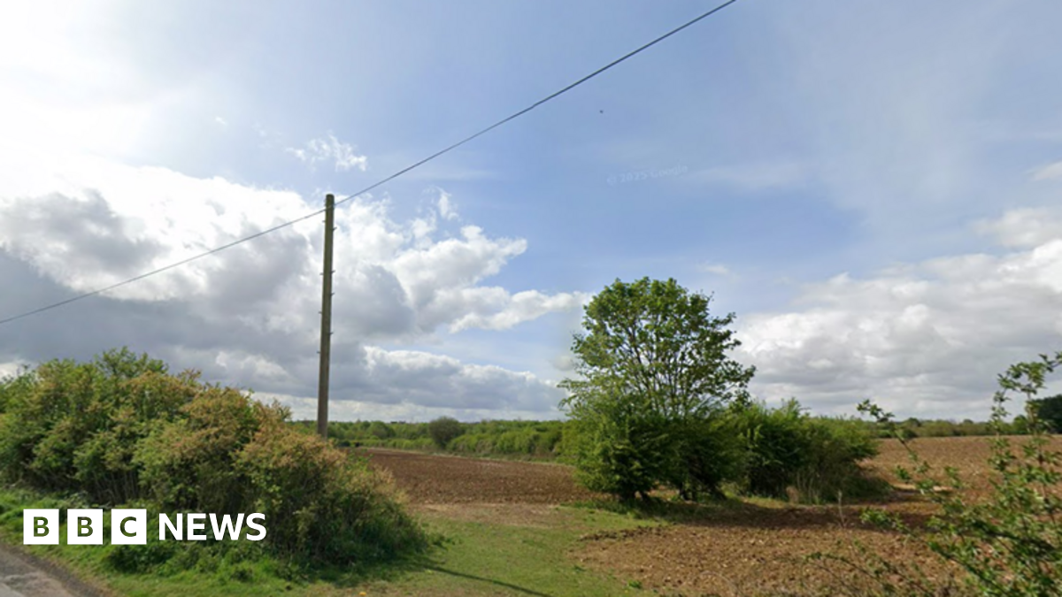 Google Streetview images of ploughed fields and trees next to a country road