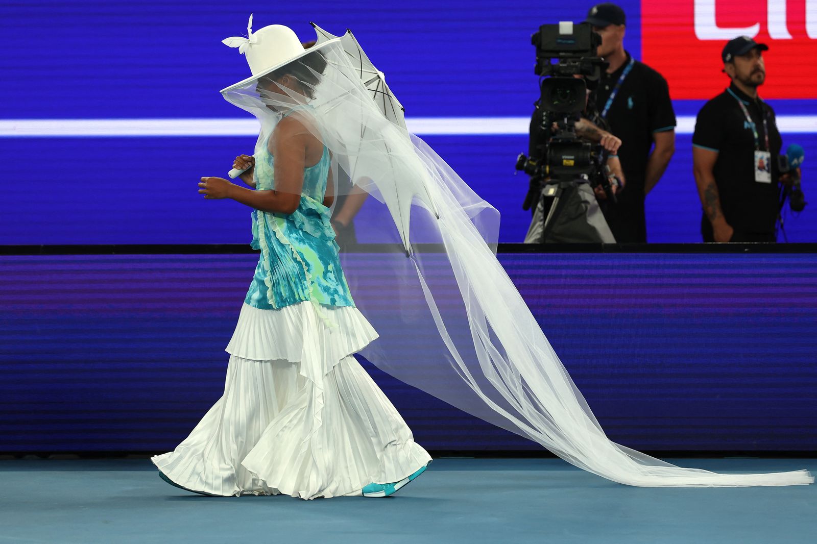 Image may contain Photography Performer Person Solo Performance Adult Wedding Bridal Veil Clothing and Dress