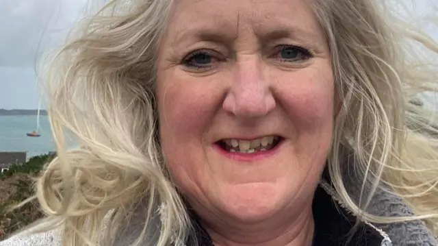 Samantha Mallon, of Toots Taxi, in a slefie with windswept blonde hair