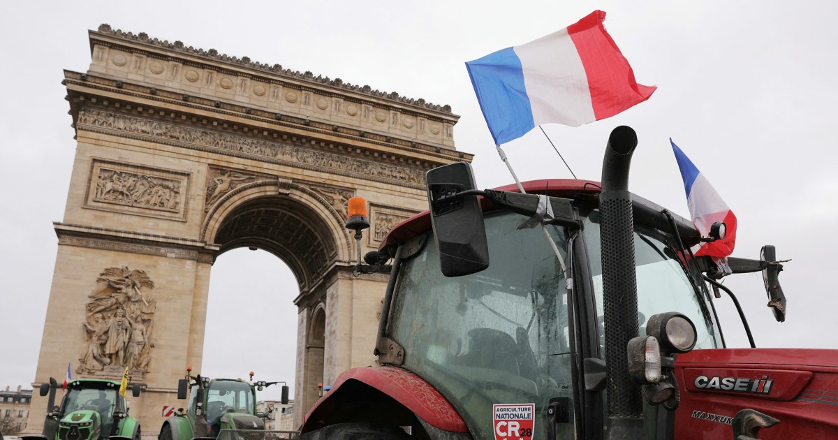 French farmers block Paris streets in protest against free trade deal