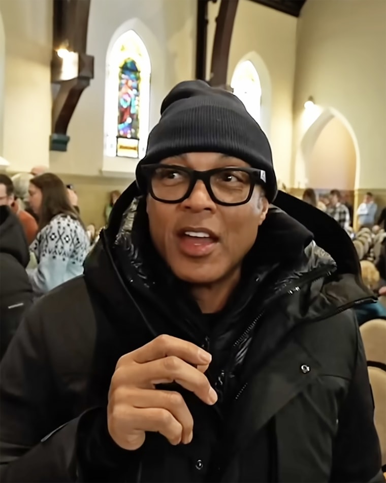 Don Lemon reporting from inside a Minnesota church during an anti-ICE demonstration.