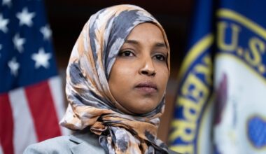 Man lunges at Ilhan Omar during town hall and tries to spray her with unknown substance