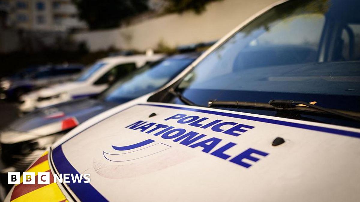 The front of a French police vehicle with "Police Nationale" on the front bonnet