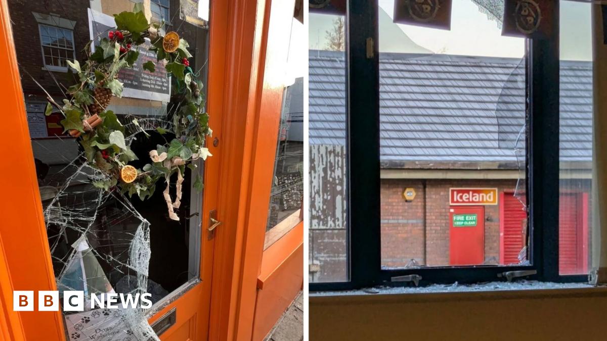 Broken windows of the Dice Jail (left) and Sanctuary Gaming Centre & Coffee Shop (right) after they were broken into by thieves