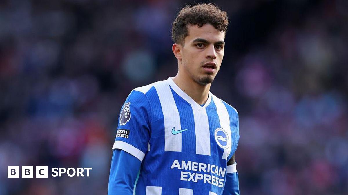 Yasin Ayari wearing a blue and white striped Brighton shirt