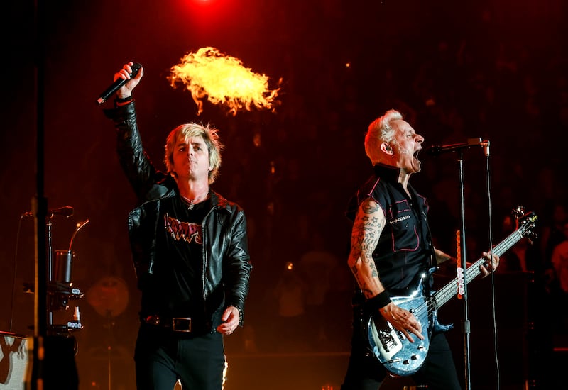 INGLEWOOD, CALIFORNIA - JANUARY 17: (FOR EDITORIAL USE ONLY) (L-R) Billie Joe Armstrong and Mike Dirnt of Green Day perform onstage at the 2026 iHeartRadio ALTer EGO presented by Capital One at The Kia Forum on January 17, 2026 in Inglewood, California. (Photo by Kevin Mazur/Getty Images for iHeartRadio)