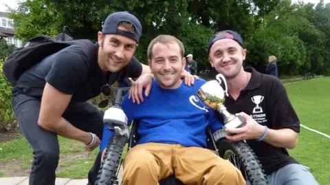 David Holmes David in the centre with Matthew Lewis who played Neville and Tom Felton who played Draco Malfoy.