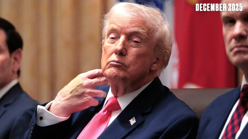A sleepy Trump wears adhesive bandages on the back of his hand during a meeting of his cabinet in the Cabinet Room of the White House on Dec. 2, 2025.