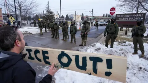 Getty Images Image shows a protest against ICE in Minneapolis